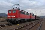 Die 140 815-2 und 140 838-4 mit einen leeren Kohlebomber in Ehrang am 25,02,12