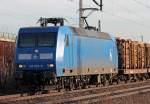 145 023-6 der PRESS mit Holzzug in Porz Wahn am 09.02.2011