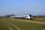 9442 352-2  ET352  + 9442 157-5  ET157  als RE 94222 (Krefeld Hbf - W-Vohwinkel) am 12.03.2016 bei Bösinghoven.
